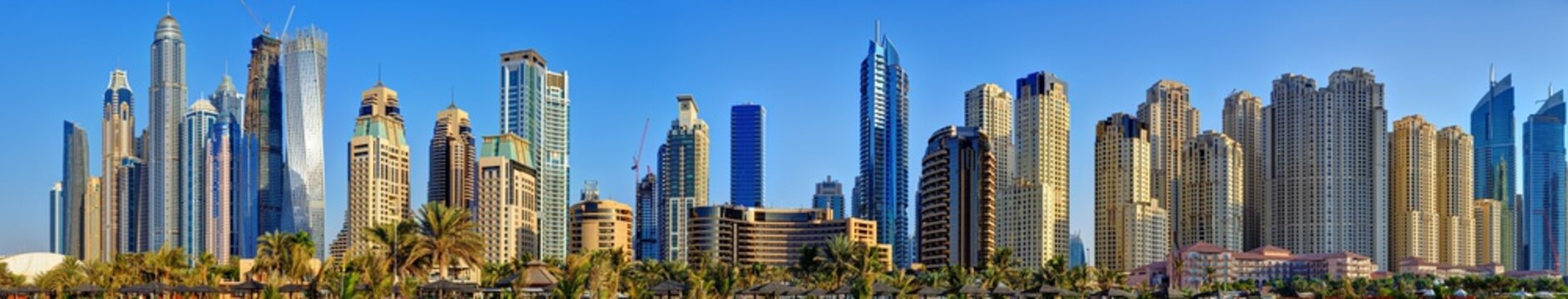Panorama of of Dubai Marina skyscrapers from Marina beach