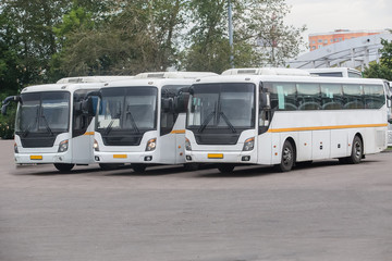 Plakat tourist buses on parking