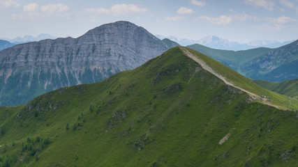 hiking path throgh the ridge with beautiful mountain in background