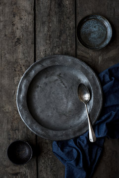 Plates in a wooden table
