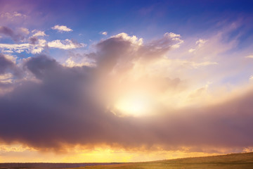 sunset in the cloudy sky