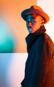 Elegantly dressed man in autumn coat and hat