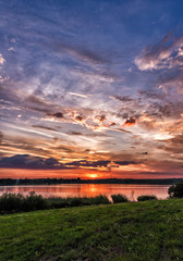 Sunset over the lake in summer