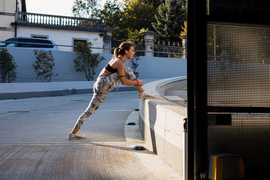 Sporty woman during workout in the city