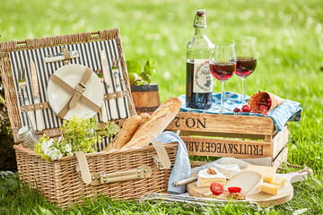 Picnic outside with a basket and delicious food