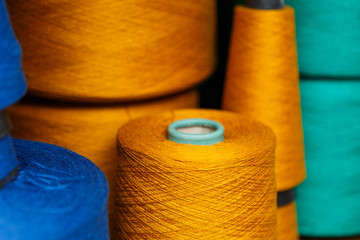 Colored skeins on the shelf
