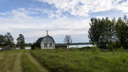 Abandoned house on the shore of the lake