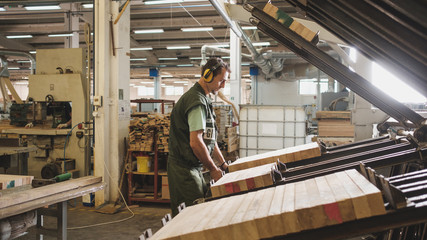 Man Working At The Furniture Factory