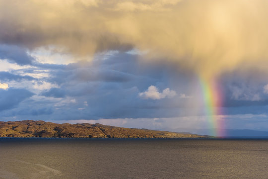 Rainbow over the coastline at the Isle of Skye in Scotland, United Kingdom