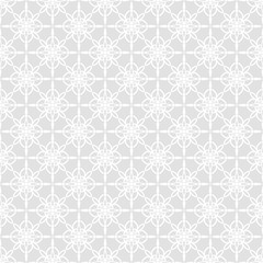 Ornate seamless pattern for wrapping paper. Beautiful White texture on gray background