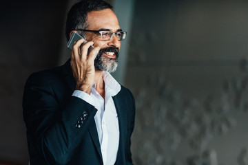 Businessman Talking on Cell Phone