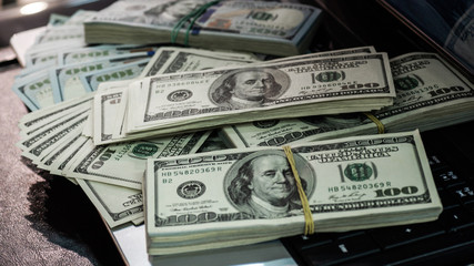 Macro shot of 100 dollar. Dollars Close Up Concept. American Dollars Cash Money. Lots of money on...