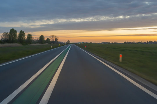 View from Driving Car at Sunset, Netherlands