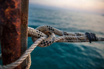 marine ropes at pier © Alena