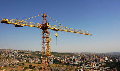 Fototapeta na wymiar Abandoned crane on cascade in Yerevan