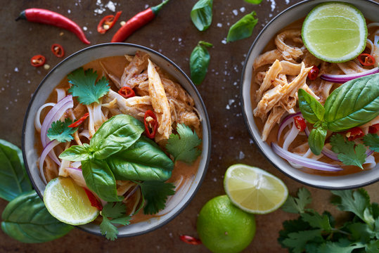 Overhead of thai red curry noodles with chicken