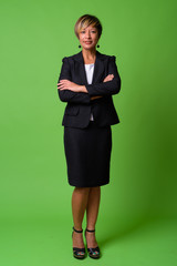 Full body shot of mature beautiful multi-ethnic businesswoman