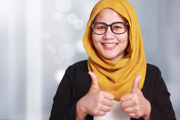 Happy Muslimah Businesswoman, Thumbs Up Gesture