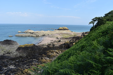 Fototapeta na wymiar View of the coastline of the island of Jersey, UK, Europe