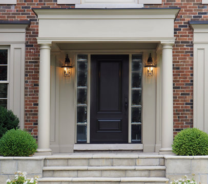 elegant front door with portico