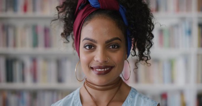 portrait attractive young hispanic woman student smiling enjoying successful lifestyle beautiful independent female slow motion