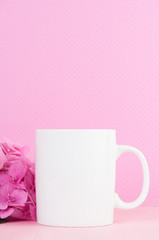 blank white coffee mug mock up with pink flowers