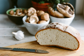 Gluten free sourdough bread and fresh mushrooms