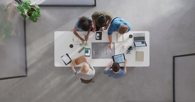 time lapse young multi ethnic design team brainstorming ideas designing bicycle using blueprint 3d render technology in modern startup office workspace top view
