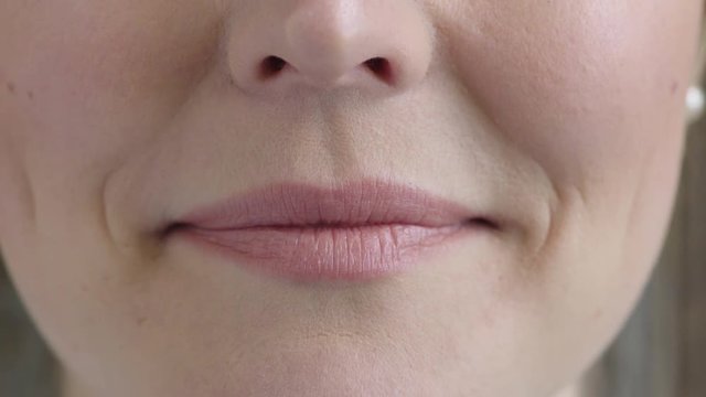 close up woman mouth smiling happy beautiful soft lips showing healthy teeth
