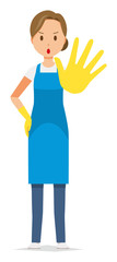 A woman wearing a blue apron and rubber gloves is stop gesture