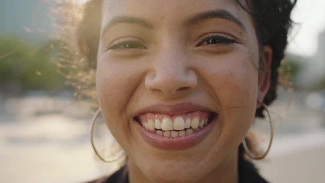 close up portrait of happy young woman business intern student laughing cheerful at camera enjoying lifestyle