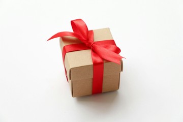 Small Gift box red ribbon on white background give for special person,copy space.