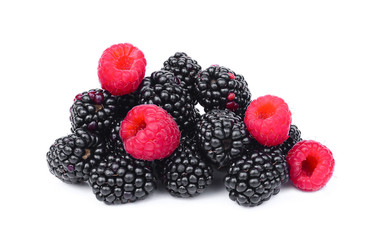 raspberries and blackberries isolated on white background