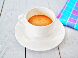 coffee cup on white wooden background