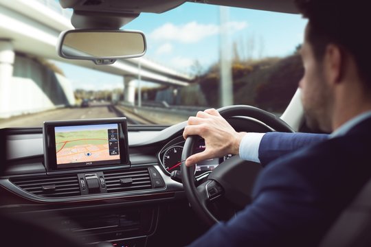 Businessman driving a car