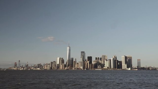 Financial skyscrapers in downtown New York in Lower Manhattan filmed from the south river in late afternoon
