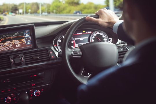 Businessman driving a car