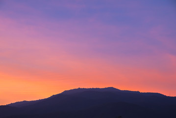   blue sky and mountain in background.