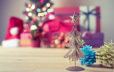 Christmas ornaments on wood table.