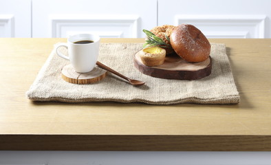 Close up view of bakers are working. Homemade bread. Eating breakfast with bread on the island table in the dining room. Morning coffee.
