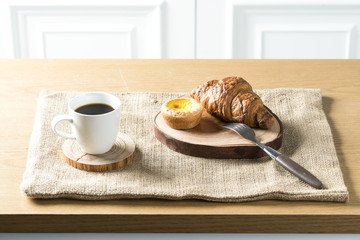 Close up view of bakers are working. Homemade bread. Eating breakfast with bread on the island table in the dining room. Morning coffee.
