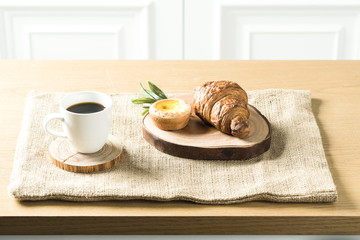 Close up view of bakers are working. Homemade bread. Eating breakfast with bread on the island table in the dining room. Morning coffee.