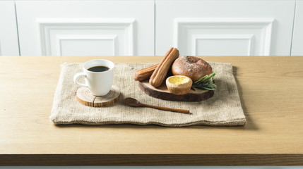 Close up view of bakers are working. Homemade bread. Eating breakfast with bread on the island table in the dining room. Morning coffee.