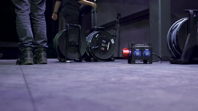 Technicians placing down the equipment for a concert