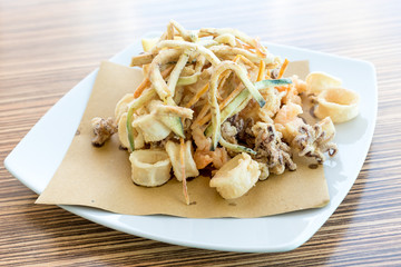 Fried mixed fish with lemon