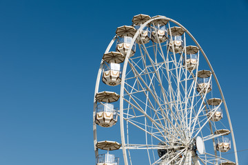 Ferris wheel with blue sky
