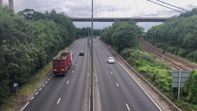 Traffic driving the road into Hull TIME_LAPSE with Humber Bridge in the background