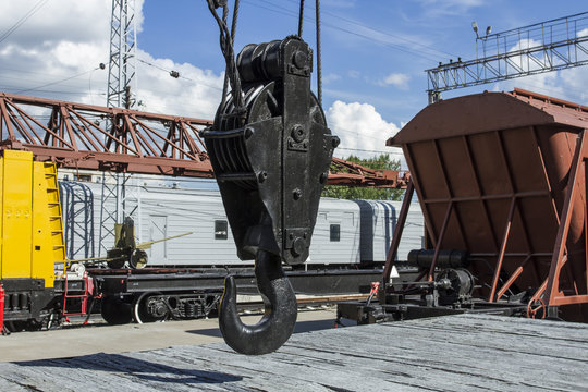 A large iron hook of a railway loader.