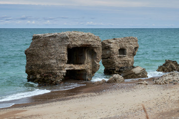 Bunker ruins near the Baltic Sea beach, part of the old fortress in the former Soviet Union base 