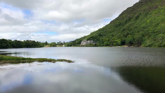Kylemore Abbey is a Benedictine monastery founded in 1920 on the grounds of Kylemore Castle, in Connemara,  Ireland. The abbey was founded for Benedictine Nuns who fled Belgium in World War I.